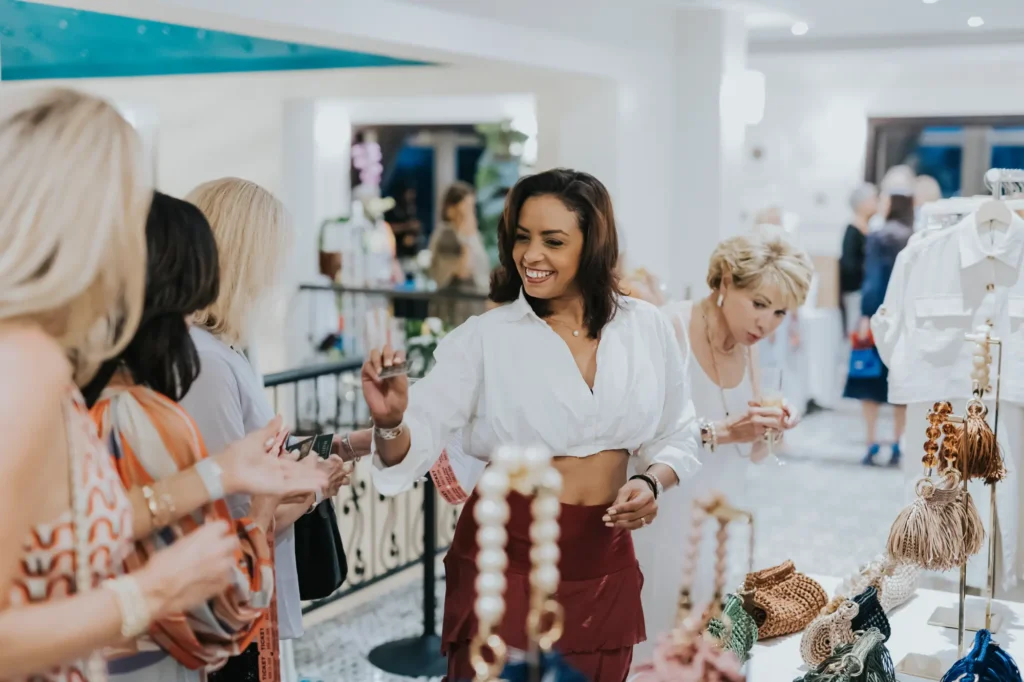 a group of women standing around a store